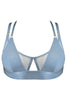 Bordelle Vero light dusty blue wireless bralette. Opaque triangles cover sheer mesh bandeau with center cutout. Two adjustable satin elastic shoulder straps on each side. Front view on plain white background.