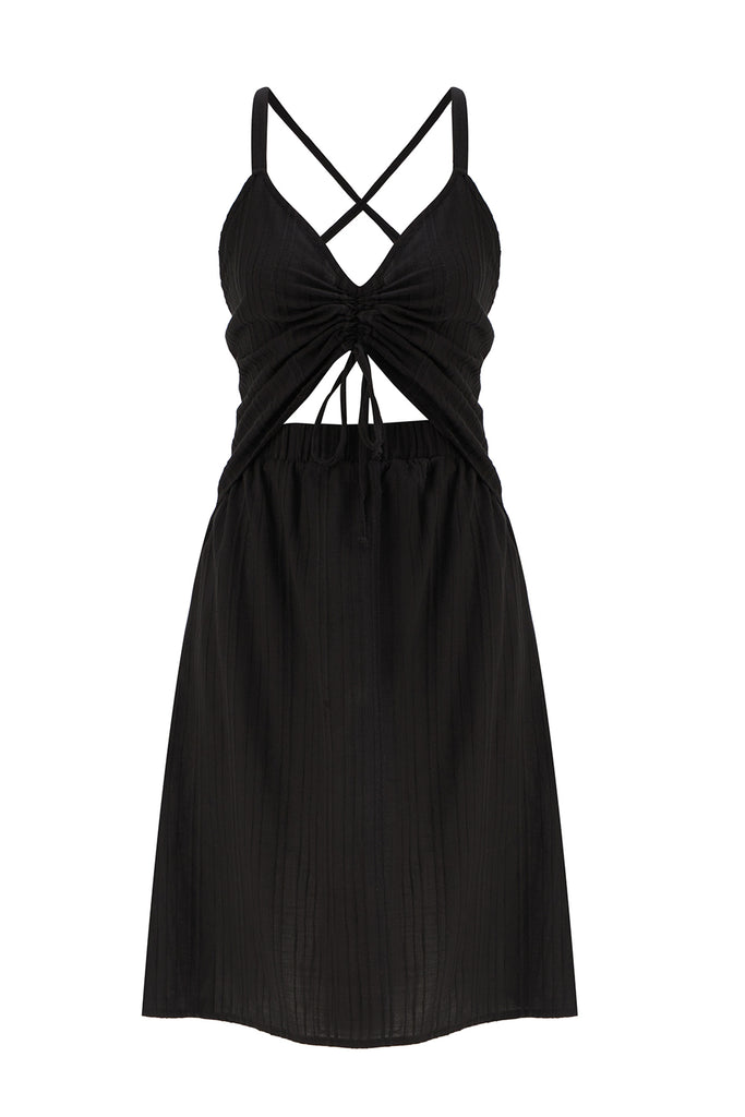 Else Ponza cotton ruched front cutout dress in black. Shown on plain white background, front view. The dress features a v-neck ruched front with tie closure. The waistband has a cutout above the elastic. The skirt is an a-line shape that hits just above the knee. 