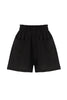Else Ponza cotton lounge shorts in black. The shorts are shown on on plain white background and feature a subtle stripe effect in the fabric, wide elastic waistband and front pockets.