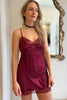 Only Hearts Silk Charmeuse Mini Slip in burgundy Dahlia with lace trim at neck, bust, and hem. Shown on model, front view.