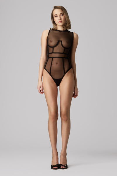 Murmur Cage black sheer mesh bodysuit with graphic black trim around bust, waist, and vertically on torso. High cut neck and legs, sleeveless design. Front view on model.