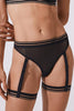 Opaak Anou thong in black sheer mesh, front view on model with matching Lil garter strap