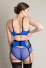Adina Reay Lyla Suspender belt in blue and black lace, on model, back view