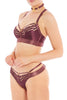 Dark purple Dala soft cup bra with adjustable cup and shoulder straps and gold plated hardware by Bordelle. Front/side view on model with matching thong and choker.