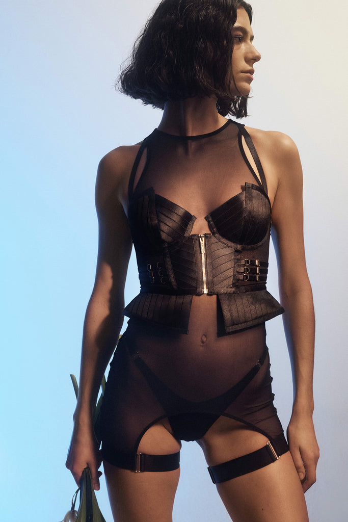 Bordelle Kora black mesh thong, front view shown on model with matching Kora Basque and Garter Dress layered over the top.