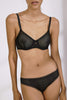 Else Betty black geometric lace underwire bra. Front view on model with matching bikini brief.