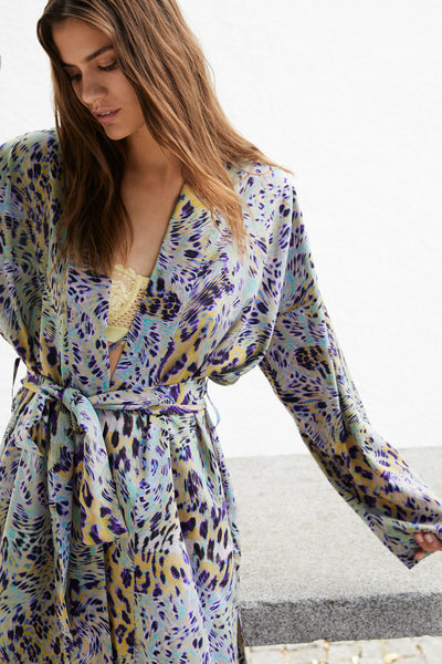 Else Nocturnal Animal silk robe in multicolor blue, purple, yellow and green animal print. Shown on model, front view.