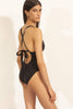 Else Olivia front gathered one piece swimsuit in black, back view of criss crossing tie straps, on model