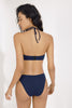 Deep blue Penelope bandeau bikini top with thin halter strap by Else. Back view on model shows black clasp at the mid back.