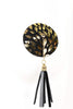 Fraulein Kink Deluxe Tassel Pasties in black and gold leather, detail view of single pasty, front view, on plain white background