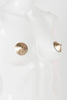 Fraulein Kink Champagne pasties in gold leather with an amber colored crystal rivet, side view on plain white background