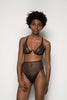 Black All Talk high waist sheer tulle brief by La Fille d'O, on model, front view, shown with matching Chime Fest bra