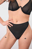 La Fille d'O Savage high waist, high leg semi sheer briefs in black mesh, front view on model