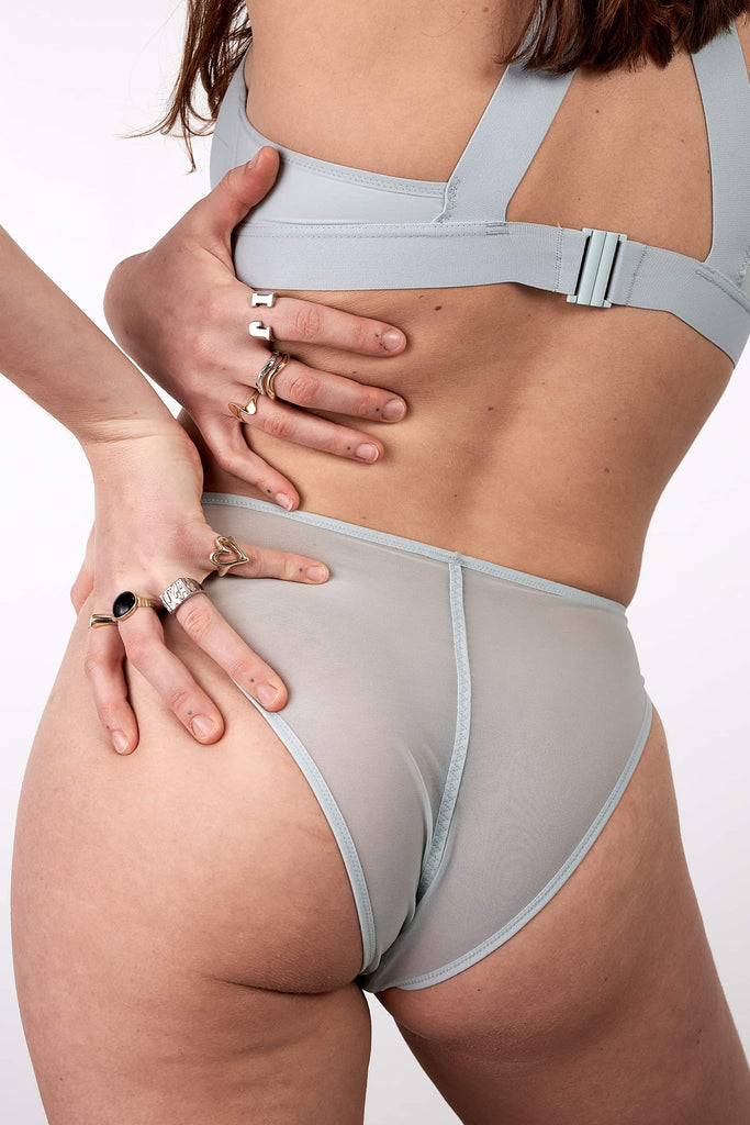 La Fille d'O Savage high waist sheer mesh brief in ice blue, close up back view on model