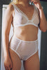 Lonely Misha High Waist Brief in sheer white lace, front view, on model in matching underwire bra