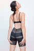 Paloma Casile Anna lace shorts in black, back view, on model