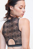 Paloma Casile Billie Crop Top/Bralette in black stretch lace with silver striped elastic underbust band, shown on model, back view showing semi circle cutout on back