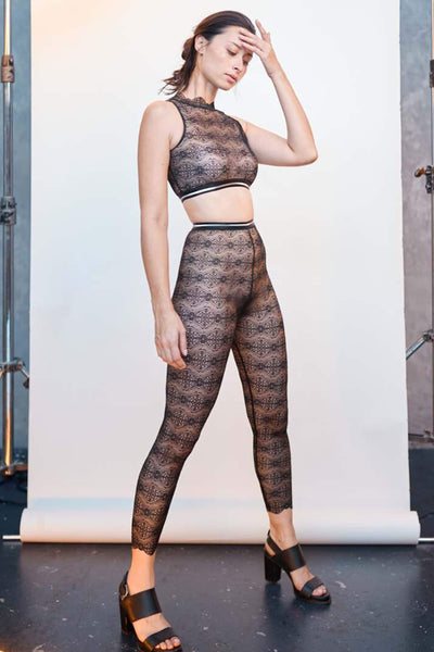 Paloma Casile Billie Crop Top/Bralette and matching legging in black stretch lace with silver striped elastic, front view on model