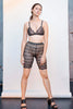Paloma Casile Billie stretch lace shorts in black, front view on model