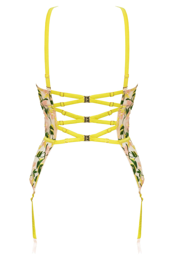 Liana chartreuse basque by Studio Pia with three straps that criss cross at the back with gold plated hardware. Back view on white background.