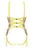 Liana yellow green basque by Studio Pia with three straps that criss cross at the back with gold plated hardware. Back view on white background. 