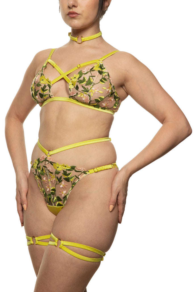 Liana bralette with gold hardware and chartreuse straps that criss cross at the chest by Studio Pia. Front/back view on model with matching waist strap knicker.