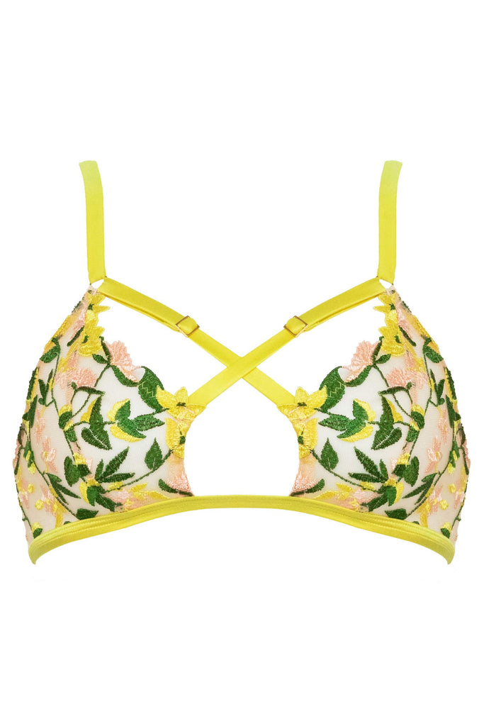 Liana bralette with gold hardware and chartreuse straps that criss cross at the chest by Studio Pia. Soft cups are sheer with spring floral embroidery. Front view on plain background.