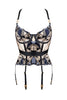 Bordelle Cubism basque in black, navy and icy blue embroidery, front view on plain white background with suspender straps attached.